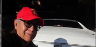 photo of father front of car